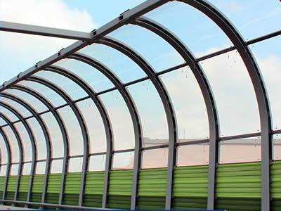 Acrylic sound barrier with nylon string in acrylic sheet is installed between roads and residents.