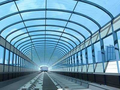 Blue polycarbonate sound barrier is installed on the subway.